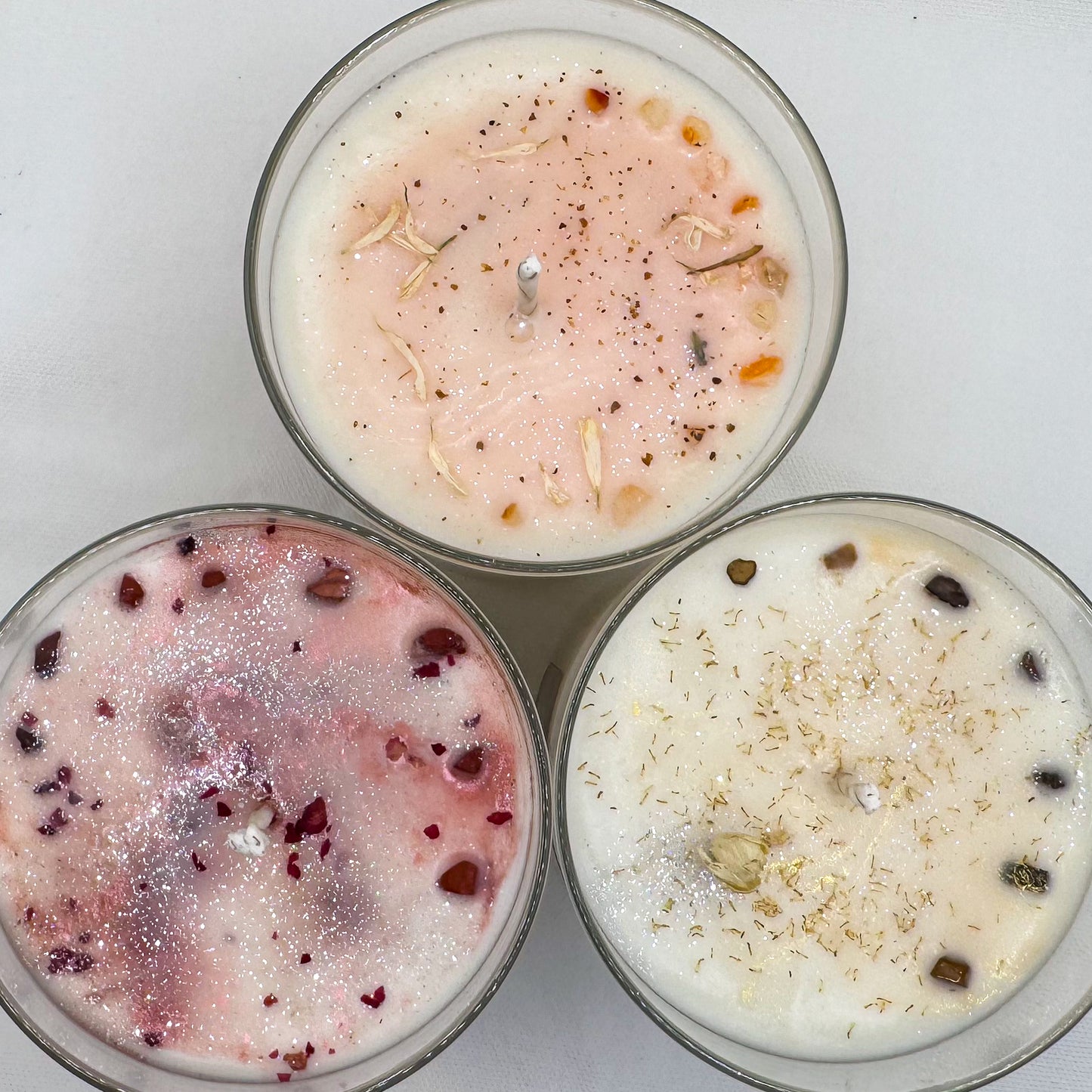 Three autumn-scented intention candles - Rooted in Harvest, Spiced Pumpkin Soul, and Golden Hour Glow